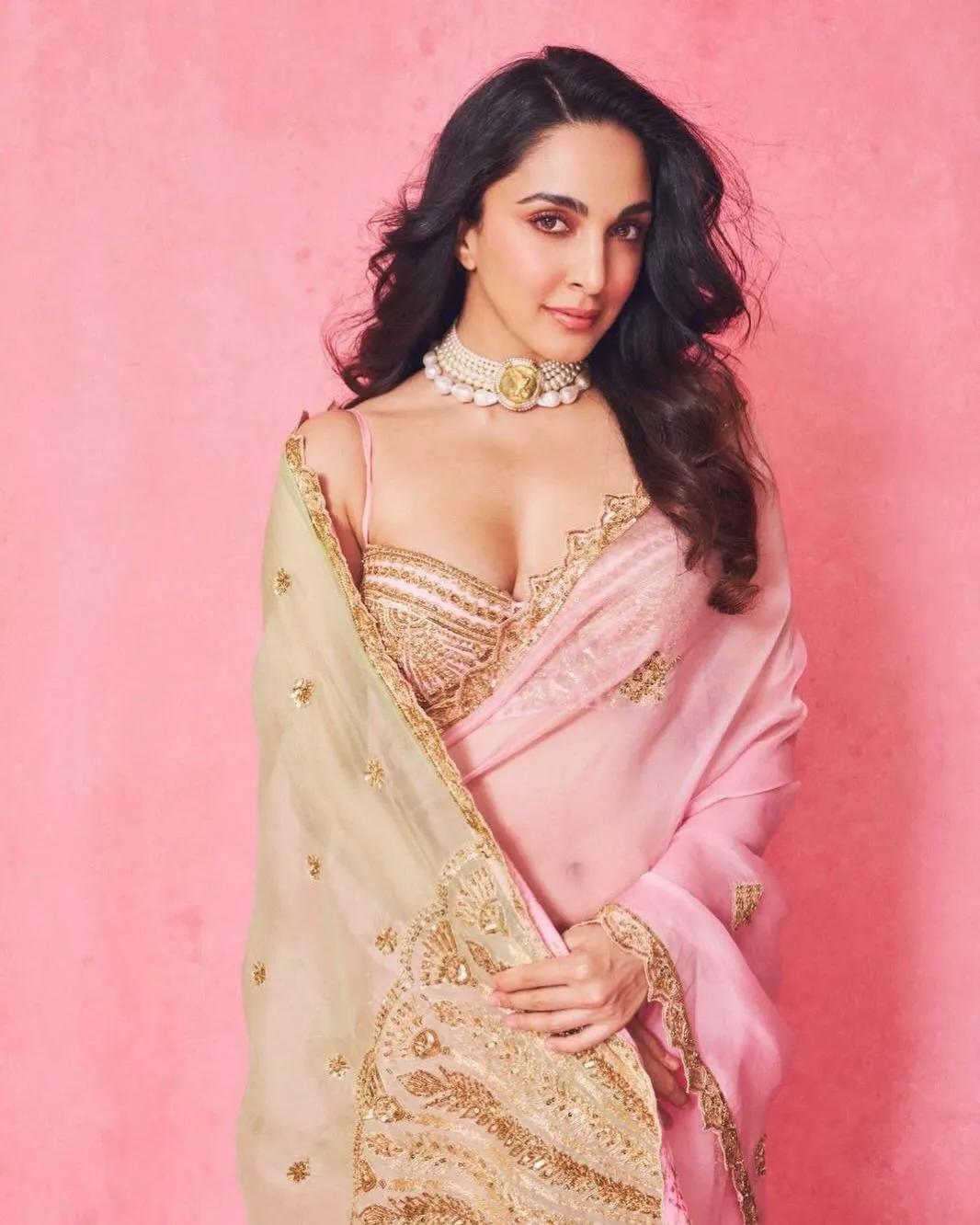 Kiara Advani wearing a pastel pink and green sari