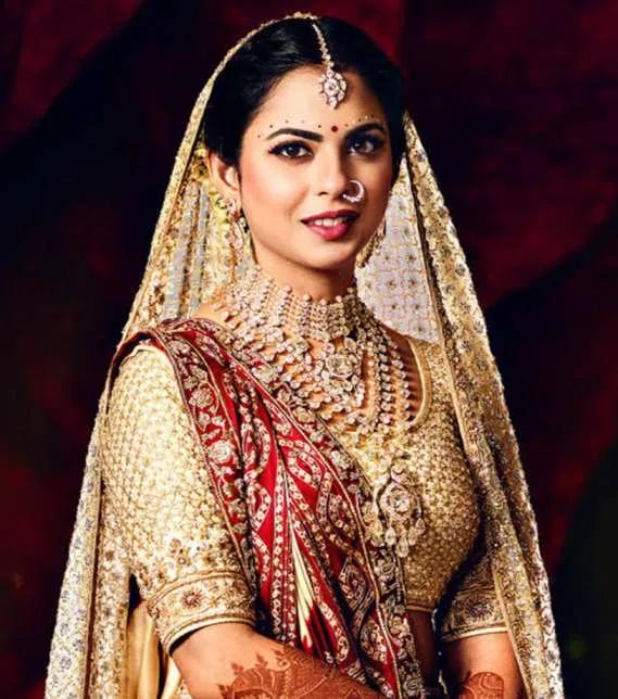 Isha Ambani wearing the red and white Peer Bindi on her wedding