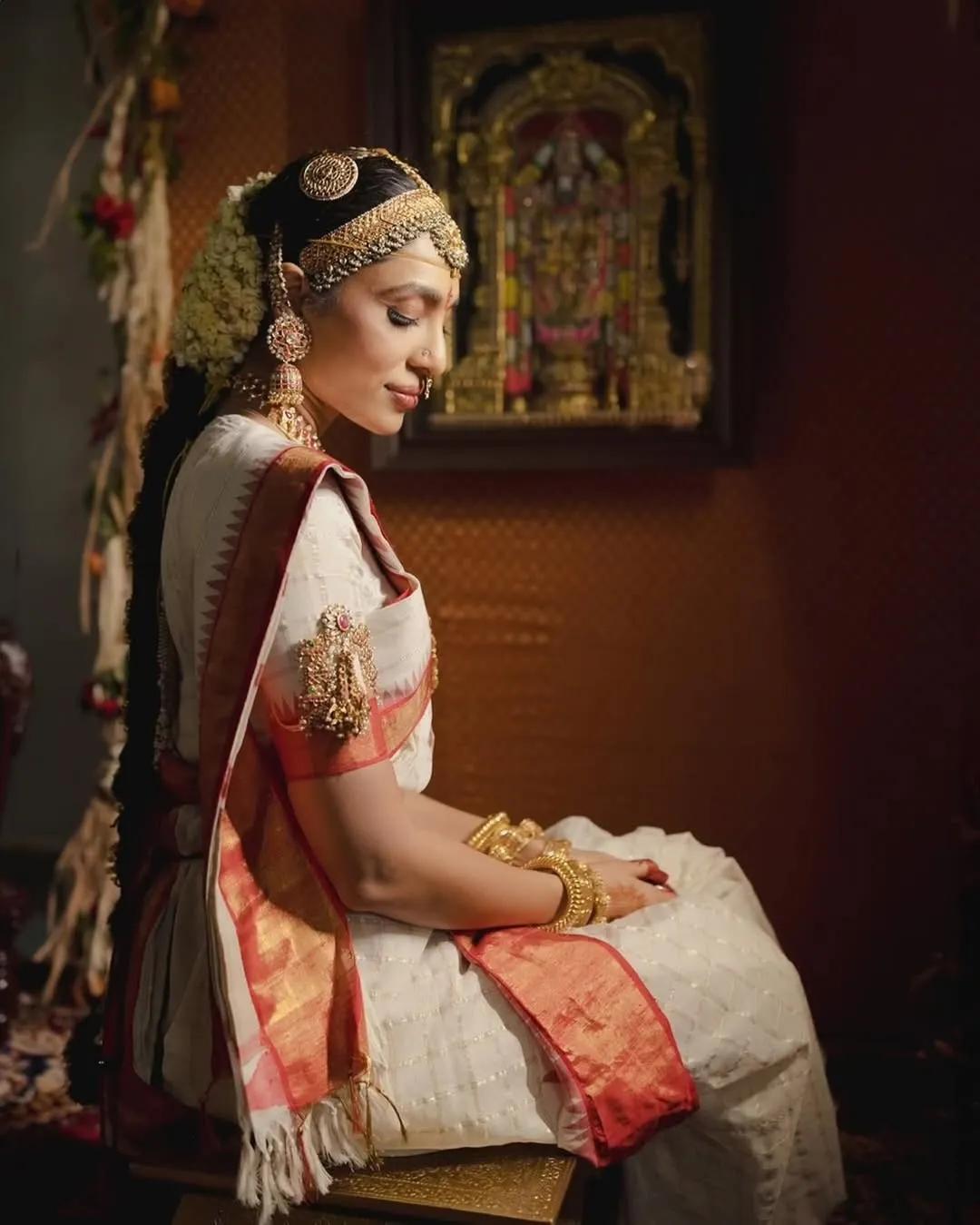 Sobhita Dhulipala wearing her hair in a braid at her wedding