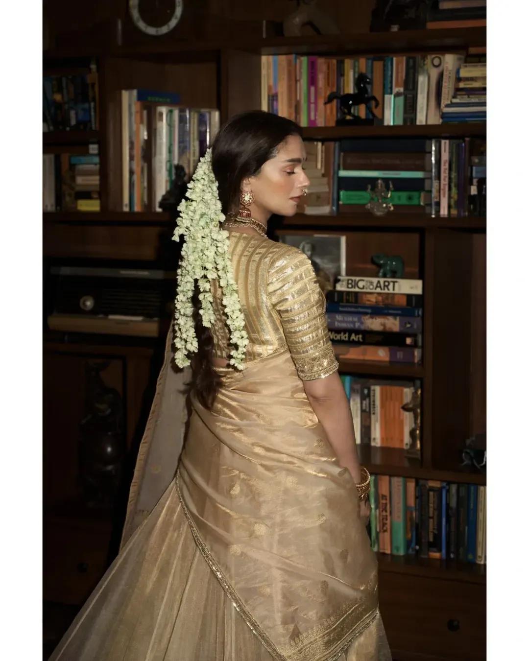 Aditi Rao Hydari wearing her hair in a braid at her wedding