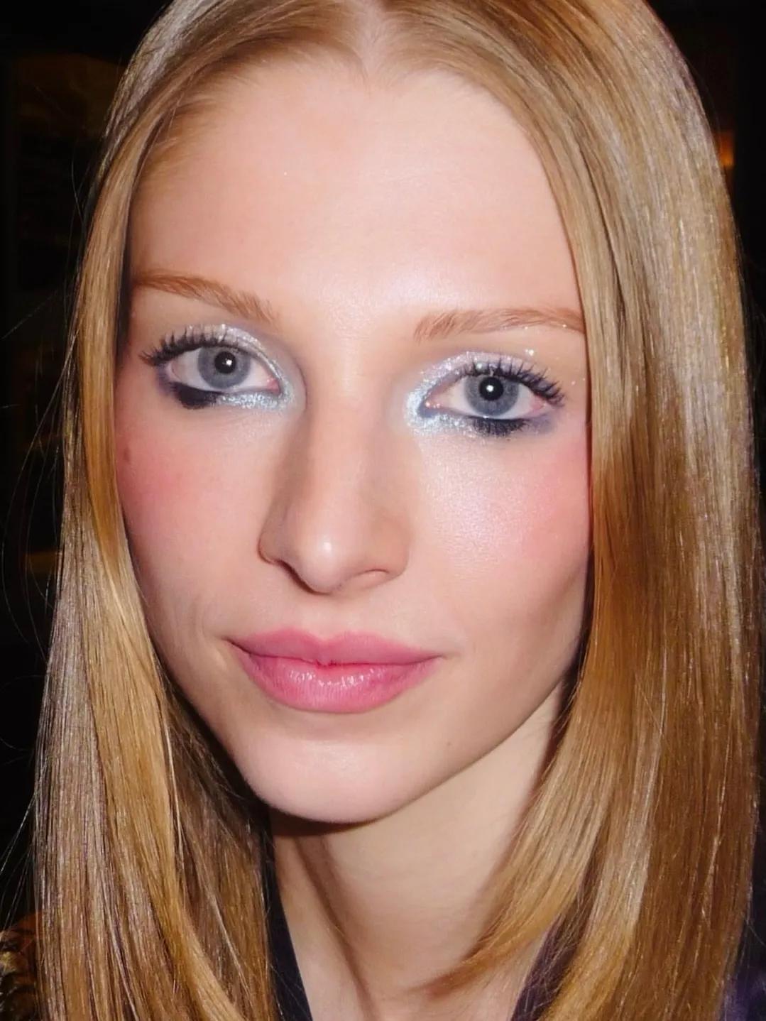 Hunter Schafer as Jules, in a make-up look that features lots of shimmer on the inner corners and a pop of black at the center of the lower lash line