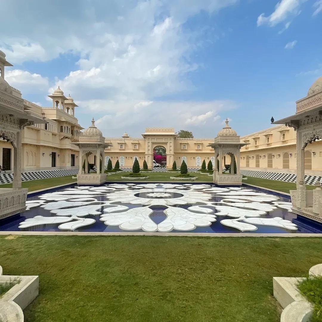 A symphony of symmetry and serenity—this courtyard at The Oberoi Udaivilas in Udaipur showcases the grandeur of Mewari architecture in all its regal glory.