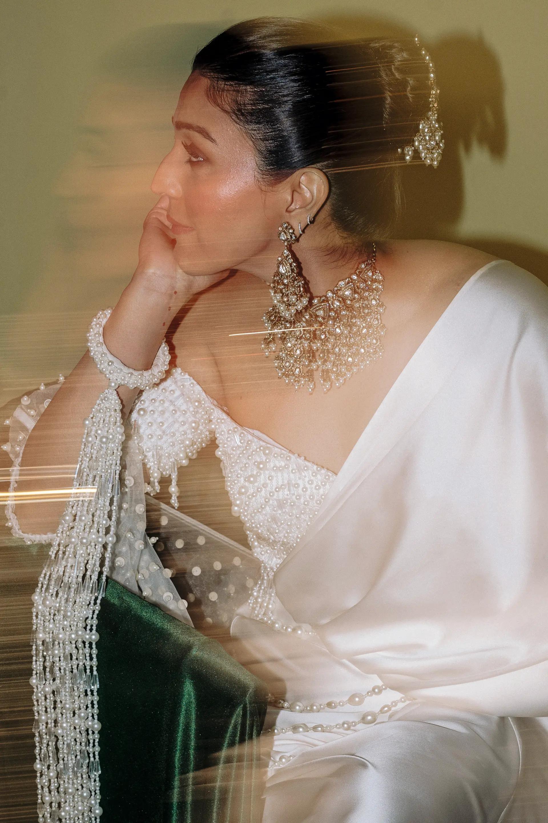 Designer Shweta Kapur wearing pearl Kaliras at her wedding