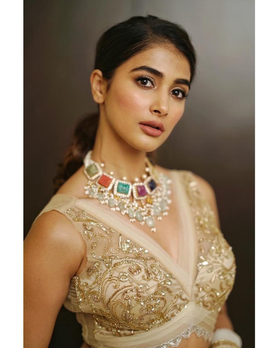 Pooja Hegde in a Navratna Necklace