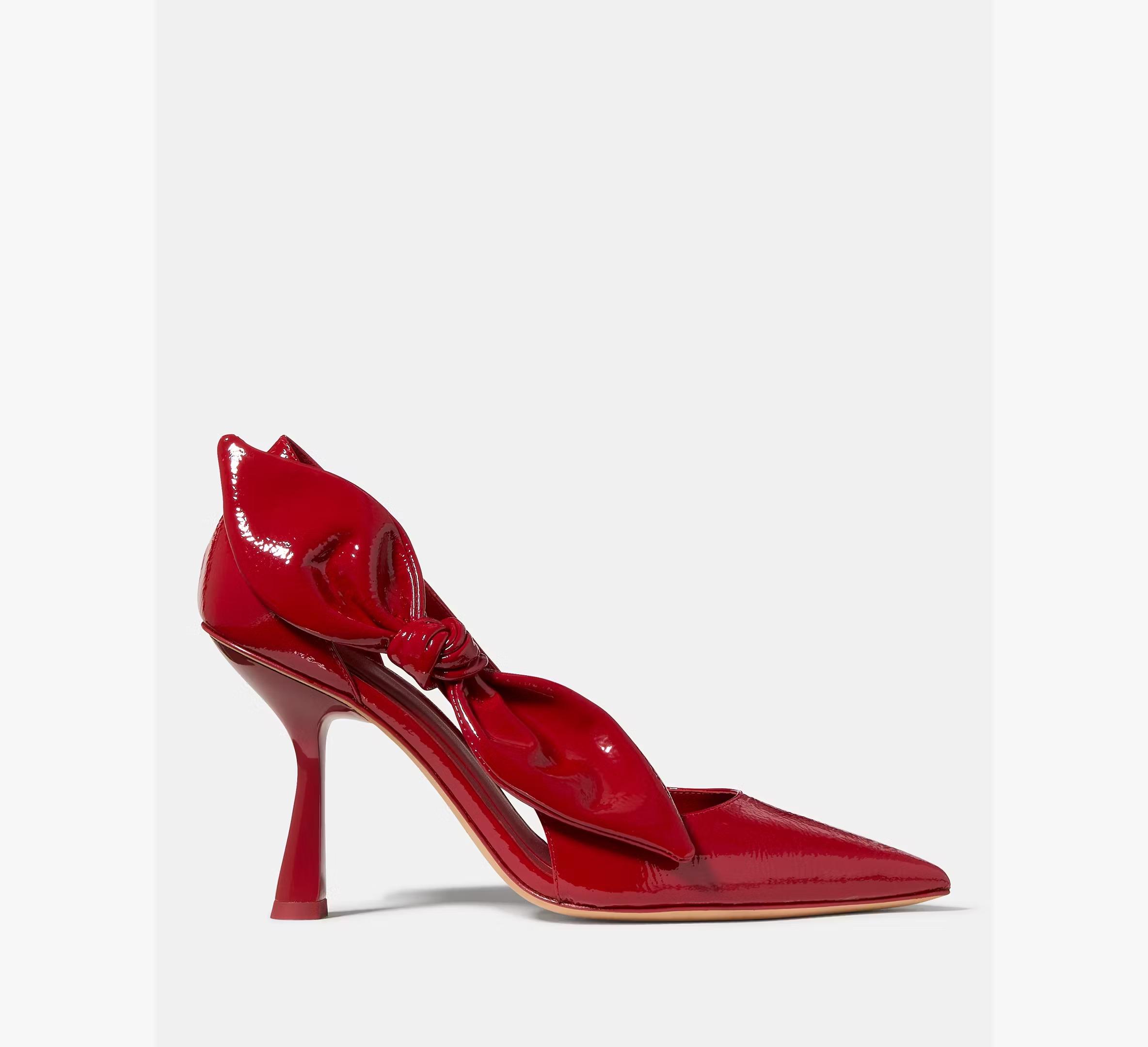 glossy red pumps from Kate Spade