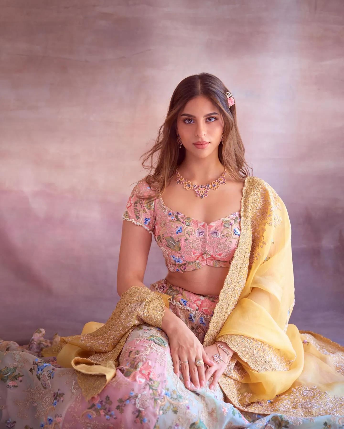 Suhana Khan wearing a pink and yellow pastel lehenga