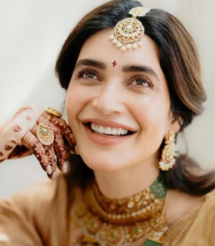 Karishma Tanna wearing the Kalyanam Tilakam or the Telugu-style bindi for her baby shower
