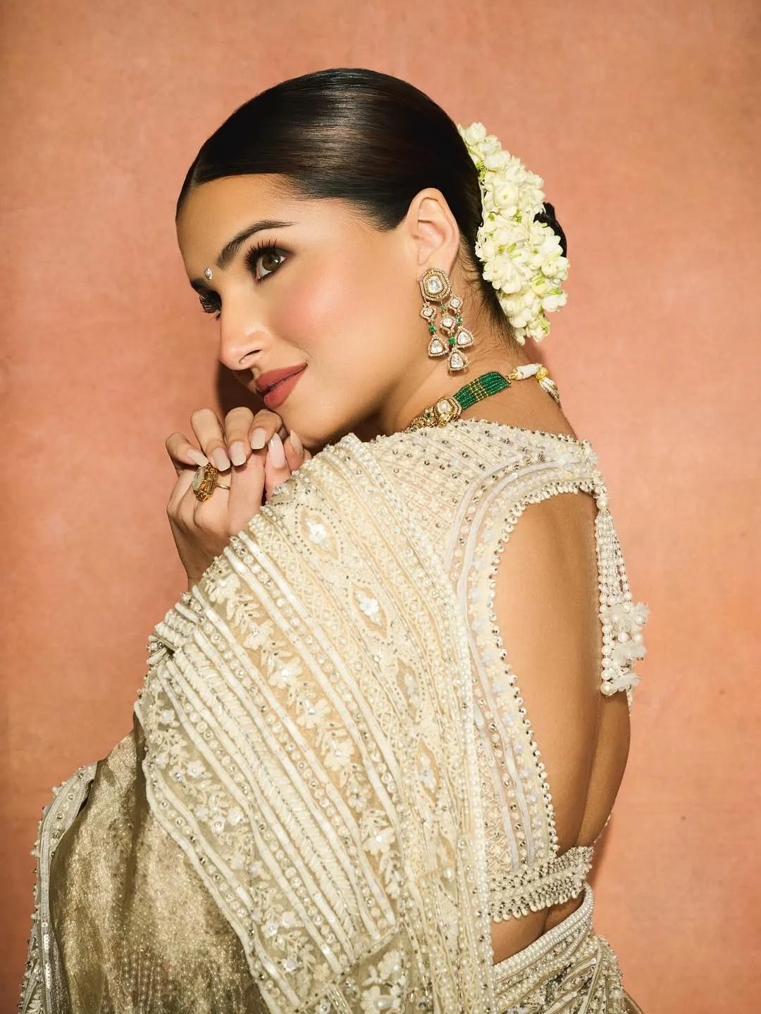 Tara Sutaria wearing a gajra around her middle-parted bun