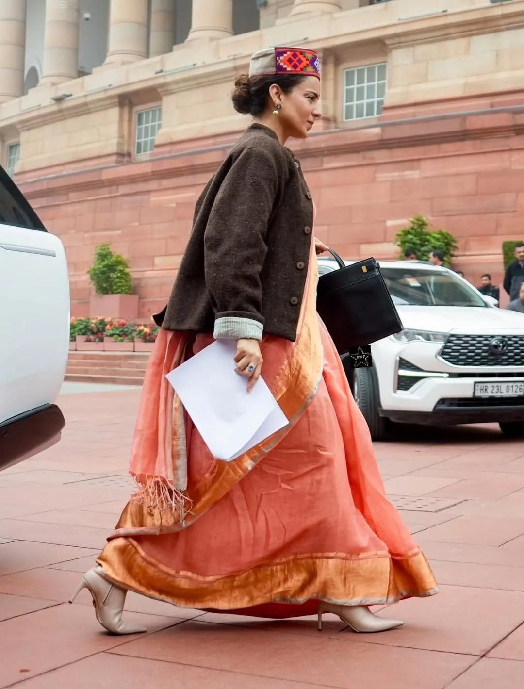 Paying homage to her roots in a Himachali cap