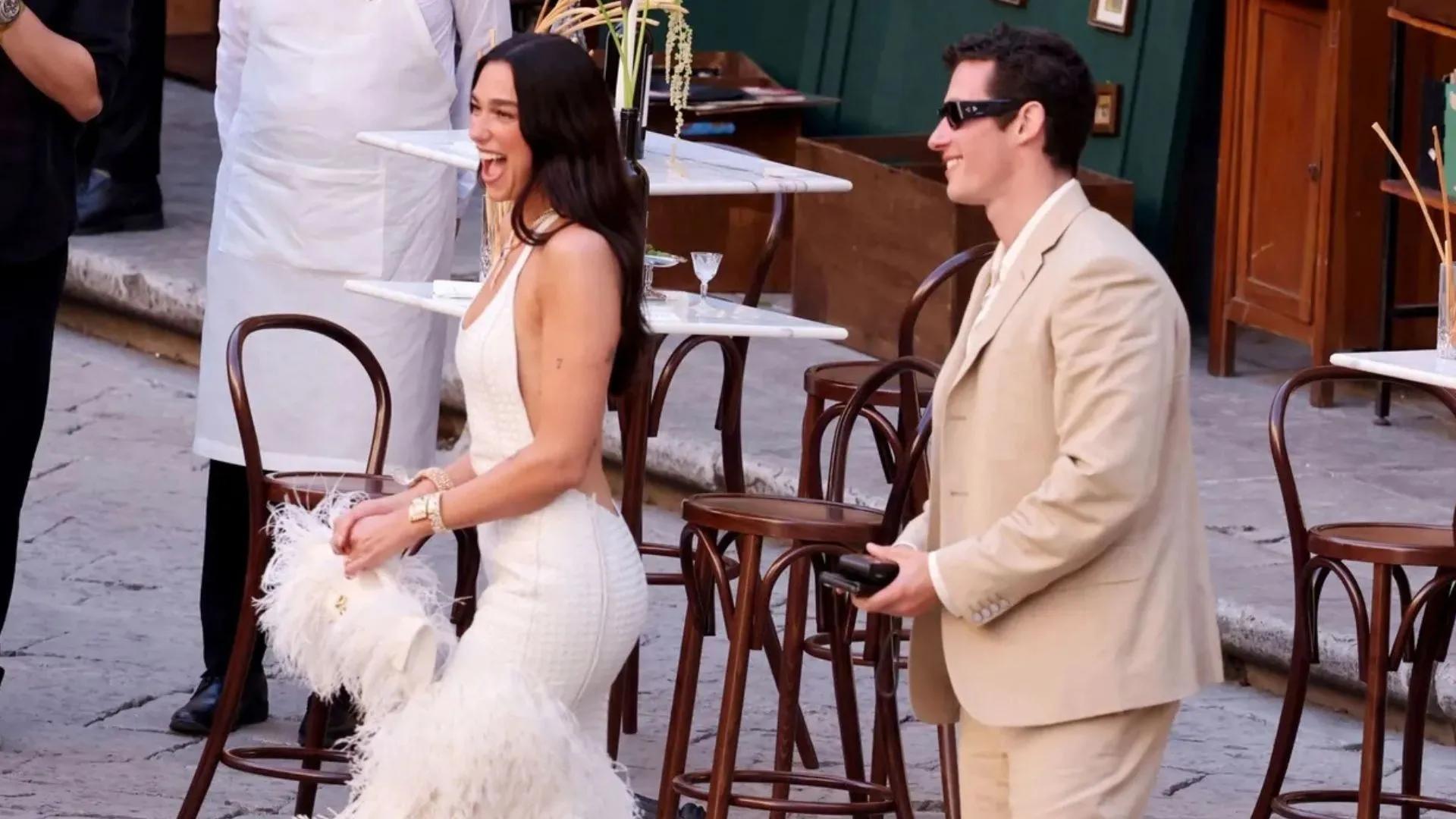 Dua Lipa and Callum Turner at one of their wedding events in Sicily