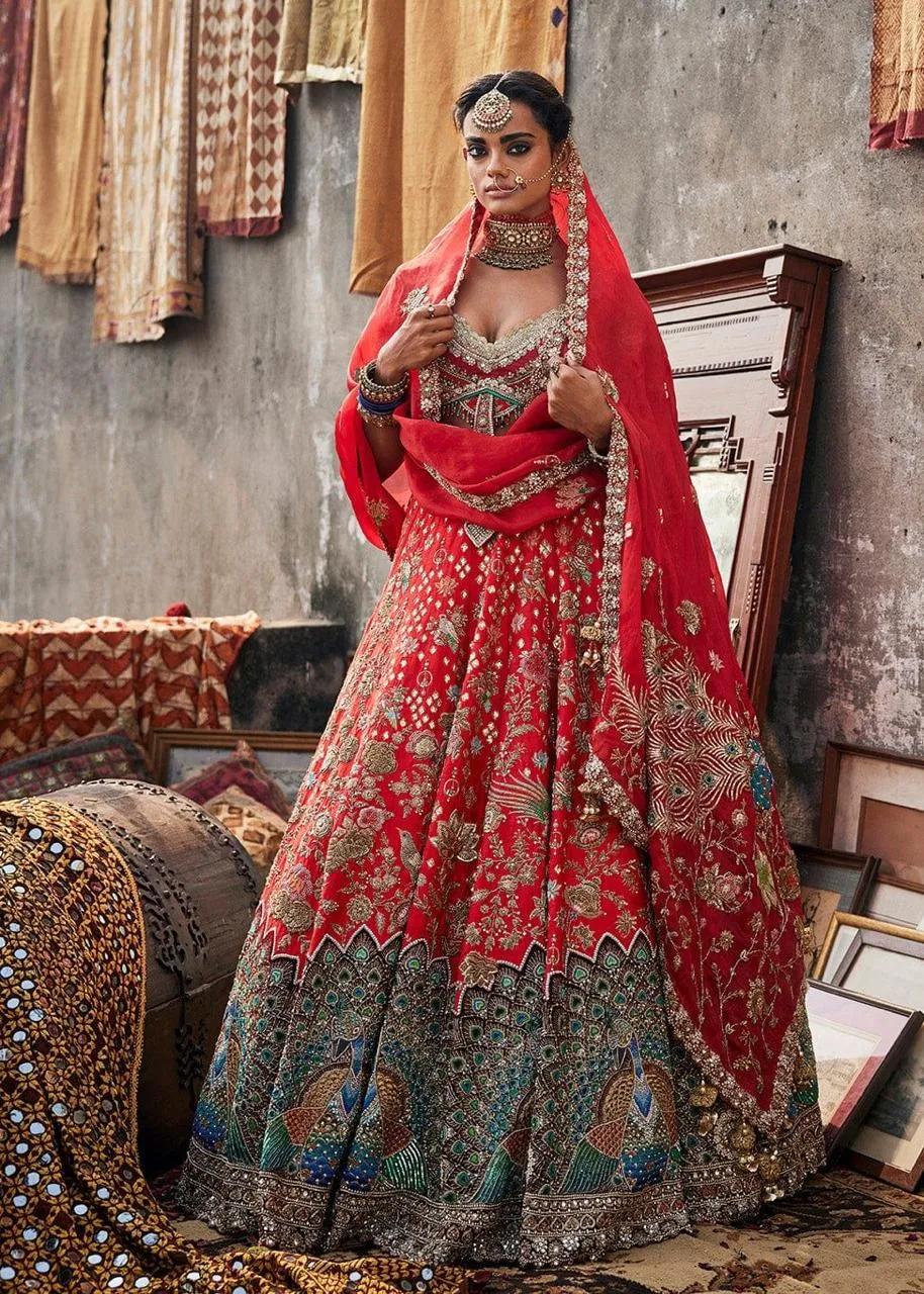 Rimpal & Harpreet's Bridal ensemble with Peacock motif