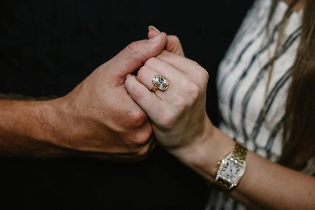 Taylor Swift wears an engagement ring with an elongated cushion-cut diamond