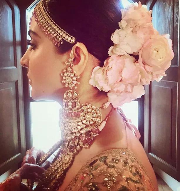 Anushka Sharma wearing her hair in an updo at her wedding