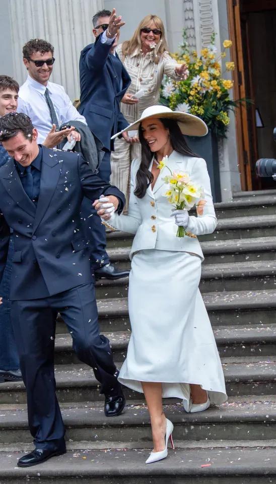 Dua Lipa and Callum Turner after their intimate civil wedding ceremony in London
